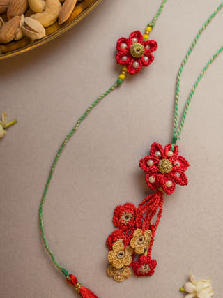 Red Flower Crochet Rakhi & Lumba Set (Set Of 2)