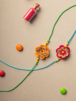 Tiny Mandala Crochet Rakhi Set (Set Of 2)