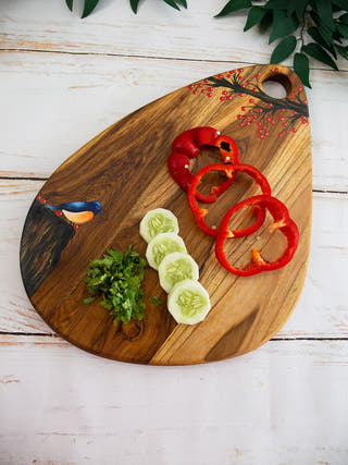 Nature Inspired Handpainted Egg Shaped Teakwood Platter Cum Cutting Board Brown Deco Talk