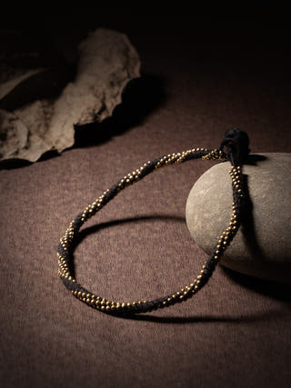 AnkletBlack Patwa Thread Anklet with Gold - Toned BeadsKaladoraFlourish Planet